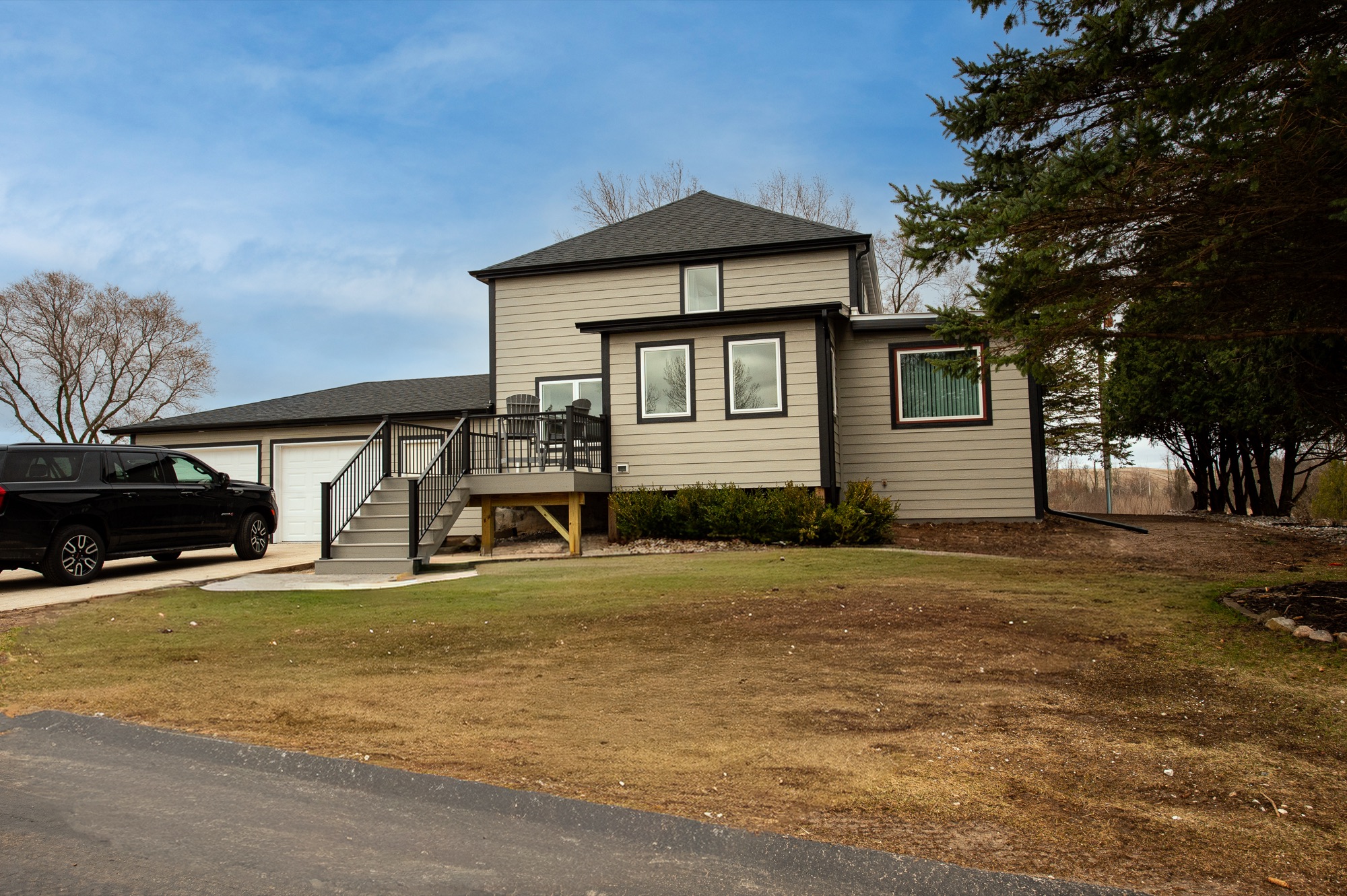 Front exterior of Mullet Manor at Kettleland Ranch with attached garage